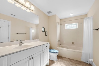 This golf course home is on the signature hole of the Dunes on Glenlakes Golf Club in Alabama - for sale on GolfHomes.com, golf home, golf lot