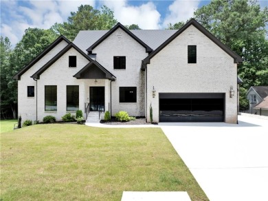 Step into an architectural masterpiece in the prestigious Indian on Indian Hills Country Club in Georgia - for sale on GolfHomes.com, golf home, golf lot