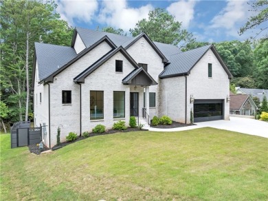 Step into an architectural masterpiece in the prestigious Indian on Indian Hills Country Club in Georgia - for sale on GolfHomes.com, golf home, golf lot