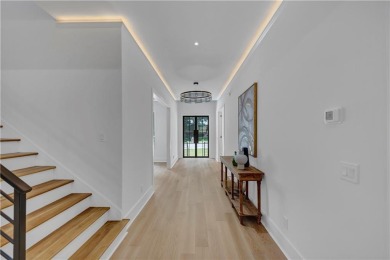 Step into an architectural masterpiece in the prestigious Indian on Indian Hills Country Club in Georgia - for sale on GolfHomes.com, golf home, golf lot