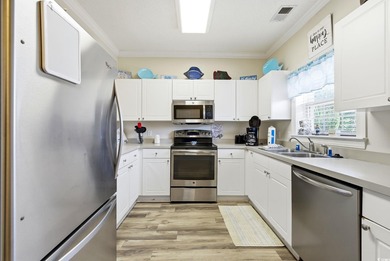 Upgraded and spacious! This beautiful 2 bed 2 bath first floor on Barefoot Resort and Golf Club  in South Carolina - for sale on GolfHomes.com, golf home, golf lot