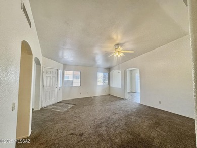 New year, new home! Step into this bright and welcoming home on Fred Enke Golf Course in Arizona - for sale on GolfHomes.com, golf home, golf lot