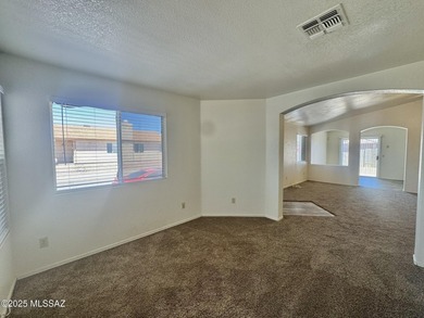 New year, new home! Step into this bright and welcoming home on Fred Enke Golf Course in Arizona - for sale on GolfHomes.com, golf home, golf lot