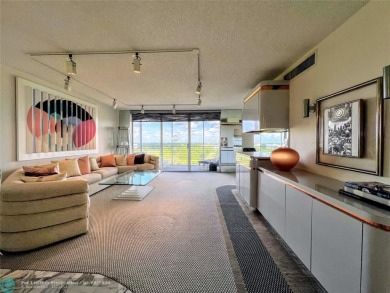 Located in the highly sought-after Palm Aire Country Club, this on Palm-Aire Country Club and Resort - Palms in Florida - for sale on GolfHomes.com, golf home, golf lot