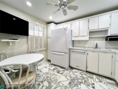 Located in the highly sought-after Palm Aire Country Club, this on Palm-Aire Country Club and Resort - Palms in Florida - for sale on GolfHomes.com, golf home, golf lot
