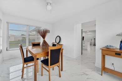 This home is completely remodeled in active 55+ community with on Leisureville Community Golf Course in Florida - for sale on GolfHomes.com, golf home, golf lot