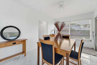 This home is completely remodeled in active 55+ community with on Leisureville Community Golf Course in Florida - for sale on GolfHomes.com, golf home, golf lot