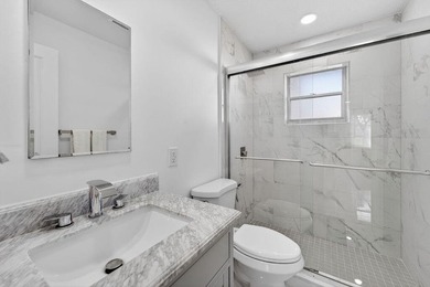 This home is completely remodeled in active 55+ community with on Leisureville Community Golf Course in Florida - for sale on GolfHomes.com, golf home, golf lot