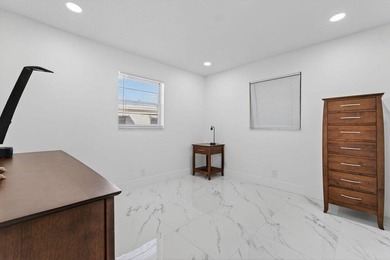 This home is completely remodeled in active 55+ community with on Leisureville Community Golf Course in Florida - for sale on GolfHomes.com, golf home, golf lot