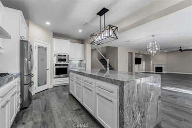 Experience luxury living in this stunning 5-bedroom, 4.5-bath on Glen Ivy Golf Club in California - for sale on GolfHomes.com, golf home, golf lot