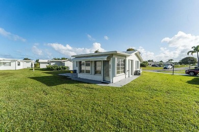 This home is completely remodeled in active 55+ community with on Leisureville Community Golf Course in Florida - for sale on GolfHomes.com, golf home, golf lot