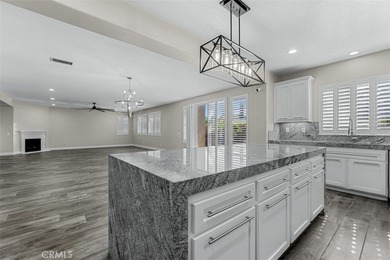 Experience luxury living in this stunning 5-bedroom, 4.5-bath on Glen Ivy Golf Club in California - for sale on GolfHomes.com, golf home, golf lot