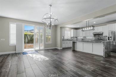 Experience luxury living in this stunning 5-bedroom, 4.5-bath on Glen Ivy Golf Club in California - for sale on GolfHomes.com, golf home, golf lot