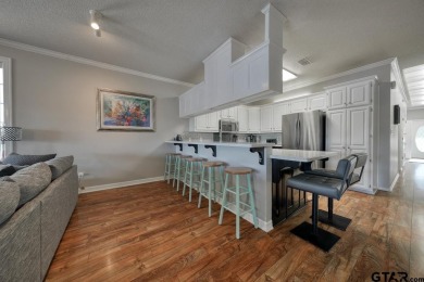 Welcome to your waterfront home! Discover the perfect blend of on Hide-A-Way Lake Golf Course in Texas - for sale on GolfHomes.com, golf home, golf lot