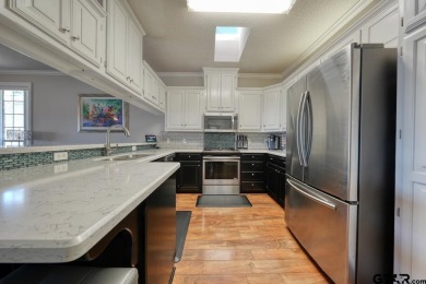 Welcome to your waterfront home! Discover the perfect blend of on Hide-A-Way Lake Golf Course in Texas - for sale on GolfHomes.com, golf home, golf lot