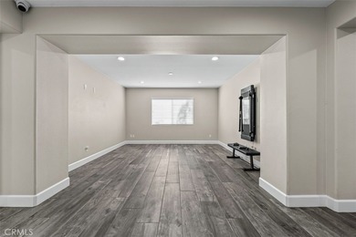 Experience luxury living in this stunning 5-bedroom, 4.5-bath on Glen Ivy Golf Club in California - for sale on GolfHomes.com, golf home, golf lot