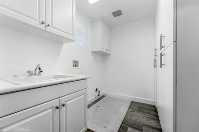 Experience luxury living in this stunning 5-bedroom, 4.5-bath on Glen Ivy Golf Club in California - for sale on GolfHomes.com, golf home, golf lot