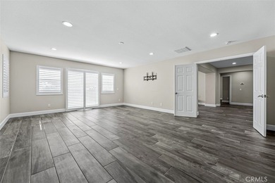 Experience luxury living in this stunning 5-bedroom, 4.5-bath on Glen Ivy Golf Club in California - for sale on GolfHomes.com, golf home, golf lot