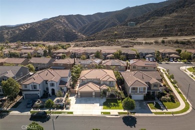 Experience luxury living in this stunning 5-bedroom, 4.5-bath on Glen Ivy Golf Club in California - for sale on GolfHomes.com, golf home, golf lot