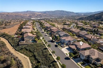 Experience luxury living in this stunning 5-bedroom, 4.5-bath on Glen Ivy Golf Club in California - for sale on GolfHomes.com, golf home, golf lot