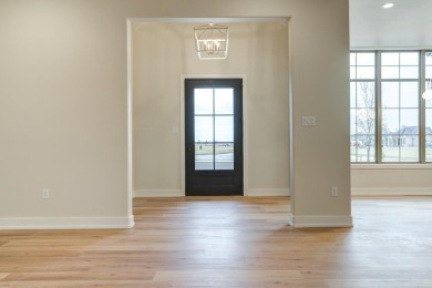 This gorgeous 4/3.5/3 sits directly across from the beautiful on Red Feather Golf and Social Club in Texas - for sale on GolfHomes.com, golf home, golf lot