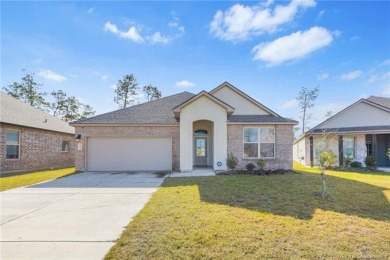 This stunning and like-new four-bedroom, three-bathroom home on The National Golf Club of Louisiana in Louisiana - for sale on GolfHomes.com, golf home, golf lot