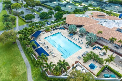 Just Listed!  Lovely 2 Bedroom, 2.5 Bath Condominium features a on  in Florida - for sale on GolfHomes.com, golf home, golf lot