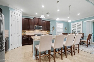 MOVE-IN READY | MAJOR UPGRADES | GOLF & WATER VIEWS! This on Herons Glen Golf and Country Club in Florida - for sale on GolfHomes.com, golf home, golf lot