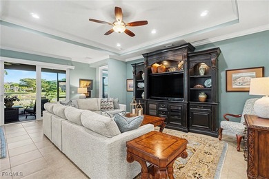 MOVE-IN READY | MAJOR UPGRADES | GOLF & WATER VIEWS! This on Herons Glen Golf and Country Club in Florida - for sale on GolfHomes.com, golf home, golf lot