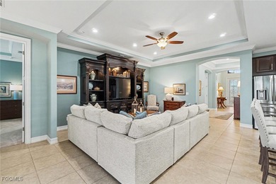 MOVE-IN READY | MAJOR UPGRADES | GOLF & WATER VIEWS! This on Herons Glen Golf and Country Club in Florida - for sale on GolfHomes.com, golf home, golf lot