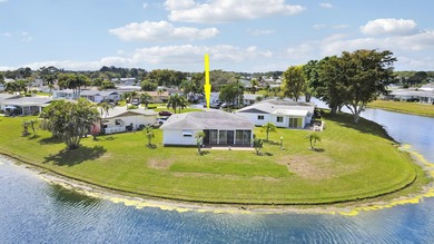 Welcome to one of the most unique waterfront homes in Cypress on Cypress Lakes Golf Course - West Palm Beach in Florida - for sale on GolfHomes.com, golf home, golf lot