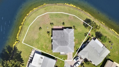 Welcome to one of the most unique waterfront homes in Cypress on Cypress Lakes Golf Course - West Palm Beach in Florida - for sale on GolfHomes.com, golf home, golf lot