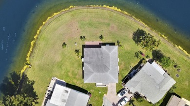 Welcome to one of the most unique waterfront homes in Cypress on Cypress Lakes Golf Course - West Palm Beach in Florida - for sale on GolfHomes.com, golf home, golf lot