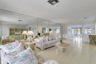 Welcome to one of the most unique waterfront homes in Cypress on Cypress Lakes Golf Course - West Palm Beach in Florida - for sale on GolfHomes.com, golf home, golf lot