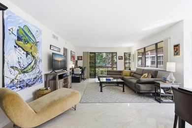 Beautiful first-floor end-unit Golf villa in the sought-after on PGA National Golf Club in Florida - for sale on GolfHomes.com, golf home, golf lot