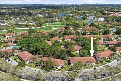 Beautiful first-floor end-unit Golf villa in the sought-after on PGA National Golf Club in Florida - for sale on GolfHomes.com, golf home, golf lot