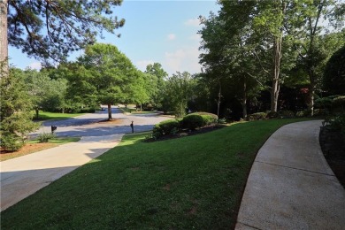 Welcome to this sweet home situated on a knoll in a quiet on The Golf Club of Georgia in Georgia - for sale on GolfHomes.com, golf home, golf lot