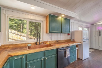 Treehouse vibes at the base of Bear Mountain Ski Resort, and on Big Bear Mountain Ski and Golf Resort in California - for sale on GolfHomes.com, golf home, golf lot
