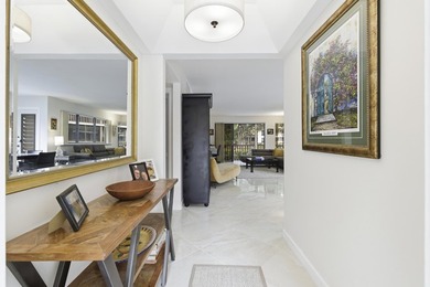 Beautiful first-floor end-unit Golf villa in the sought-after on PGA National Golf Club in Florida - for sale on GolfHomes.com, golf home, golf lot