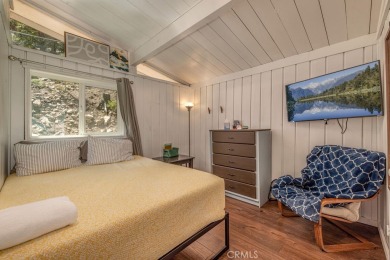 Treehouse vibes at the base of Bear Mountain Ski Resort, and on Big Bear Mountain Ski and Golf Resort in California - for sale on GolfHomes.com, golf home, golf lot