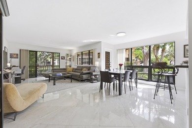 Beautiful first-floor end-unit Golf villa in the sought-after on PGA National Golf Club in Florida - for sale on GolfHomes.com, golf home, golf lot