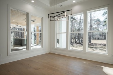 Experience the perfect blend of luxury, comfort, and scenic Golf on Harbor Club Golf and Country Club in Georgia - for sale on GolfHomes.com, golf home, golf lot