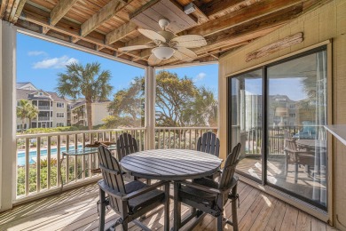 Experience coastal living at its finest in this beautifully on Wild Dunes Harbor Golf Resort in South Carolina - for sale on GolfHomes.com, golf home, golf lot