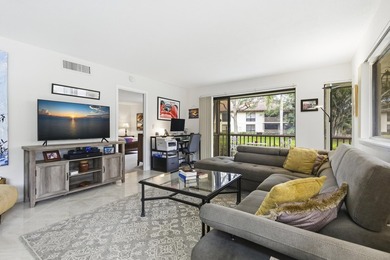 Beautiful first-floor end-unit Golf villa in the sought-after on PGA National Golf Club in Florida - for sale on GolfHomes.com, golf home, golf lot