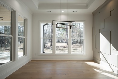 Experience the perfect blend of luxury, comfort, and scenic Golf on Harbor Club Golf and Country Club in Georgia - for sale on GolfHomes.com, golf home, golf lot