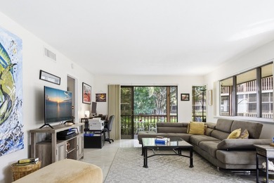 Beautiful first-floor end-unit Golf villa in the sought-after on PGA National Golf Club in Florida - for sale on GolfHomes.com, golf home, golf lot