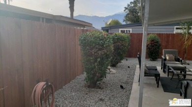 Built in 1974, this 1152 sq foot double wide bungalow is ready on Date Palm Country Club in California - for sale on GolfHomes.com, golf home, golf lot