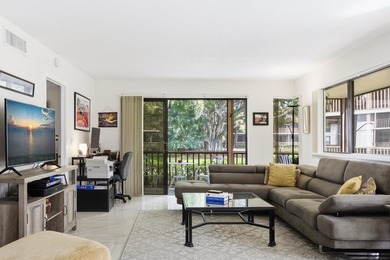 Beautiful first-floor end-unit Golf villa in the sought-after on PGA National Golf Club in Florida - for sale on GolfHomes.com, golf home, golf lot