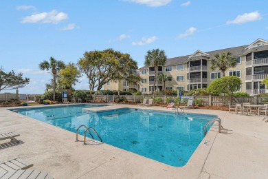 Experience coastal living at its finest in this beautifully on Wild Dunes Harbor Golf Resort in South Carolina - for sale on GolfHomes.com, golf home, golf lot