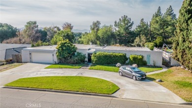 A spacious single-story ranch home with 2686 sqft of living on Jurupa Hills Country Club in California - for sale on GolfHomes.com, golf home, golf lot